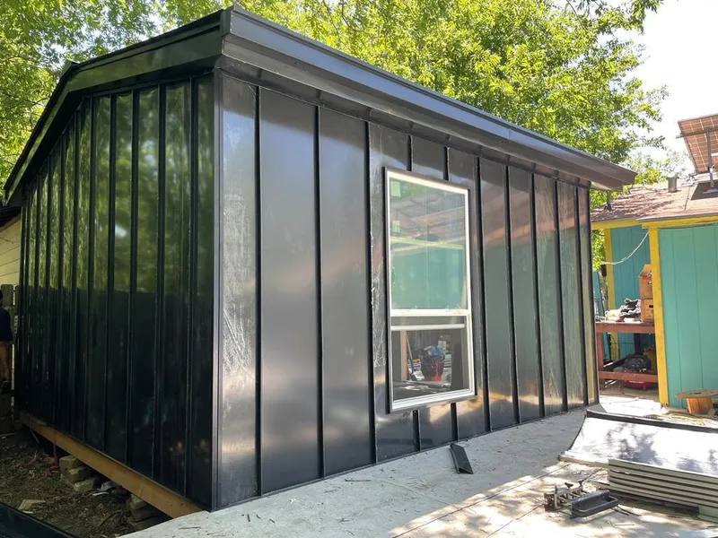 Black standing seam metal wall panels for Metal Roof Installation in Raceland